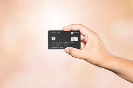 Hand holding credit card , business idea conceptのeditorial素材
