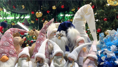 Christmas decoration in the form of Santa Claus and angels on the Christmas treeの写真素材