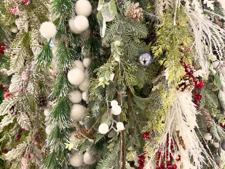 Decorated Christmas tree in a shop, closeup of photoの写真素材