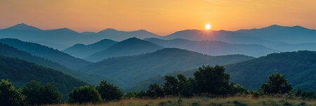 Majestic sunset in the mountains landscape. Panoramic view.の写真素材