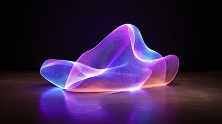 Abstract light sculpture glowing with dynamic blue, purple, and orange neon colors, creating a futuristic art installation reflecting on a dark, polished surfaceの写真素材
