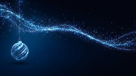 Blue glittering christmas ornament hanging from a sparkling particle trail on a dark background, evoking a festive and abstract winter holiday conceptの写真素材