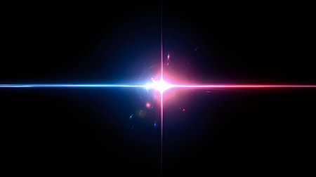 Abstract background presenting a bright anamorphic light flare with contrasting red and blue beams colliding in the center, creating a vibrant burst of energy and glow on a dark backdropの写真素材