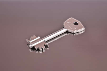 Key, reflection, background, aluminum and shadow from a keyの写真素材