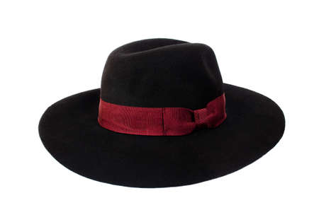 black hat with a bow isolated on whiteの写真素材