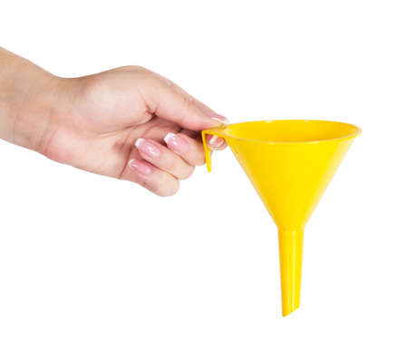 hand holds a funnel isolated on white backgroundの写真素材