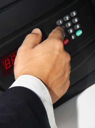 Businessman opens safe