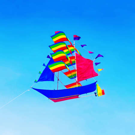 colorful kite flying in the skyの写真素材