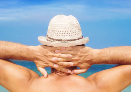 man resting on the beach