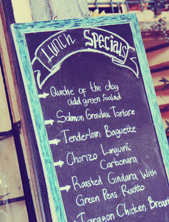 board with the words menu in the restaurant. vintage effect