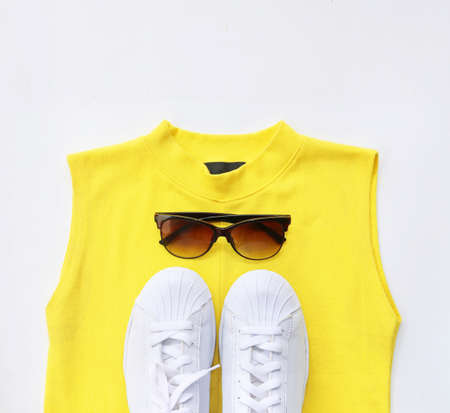 fashion blogger concept. Minimal set of Feminine accessories on white background.