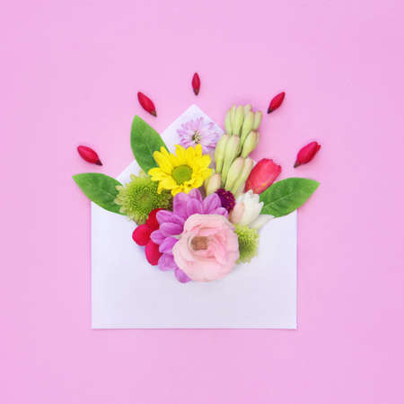 envelope full of various flowersの写真素材