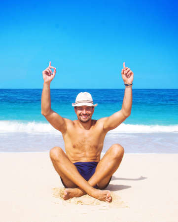 Happy man resting at seaの写真素材