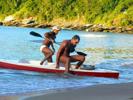 Brasilians in a Canoe in Buzios - Brazilのeditorial素材