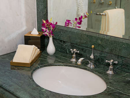 Hand towel on wood tray
