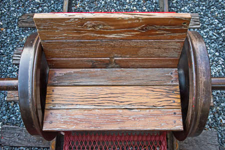 The bench, made of train wheels. Placed over railroad tracks beautifully.の写真素材