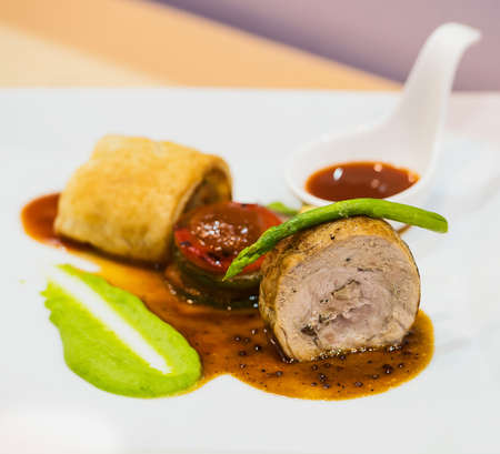 Grilled chicken breast stuffed with basil, and garlicの写真素材