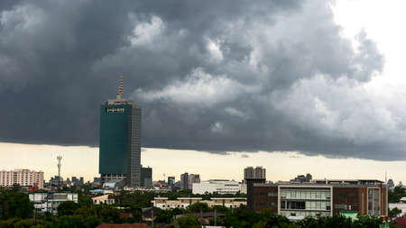Cumulonimbus and stratocumulus clouds before the rain over the horizon.