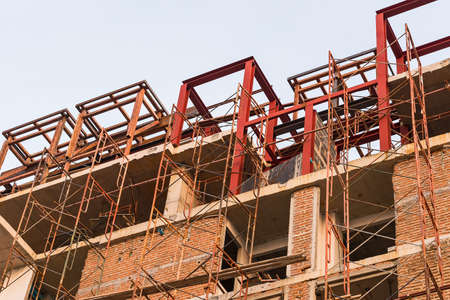 Construction of new buildings with red bricks.の写真素材