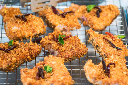 Spicy fried fish in spicy batter.
