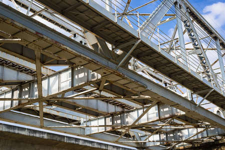 Under the bridge steel construction close up background and texture