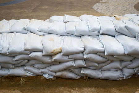 Sandbag to prevent flooding in the rainy season, preventive concept.の写真素材