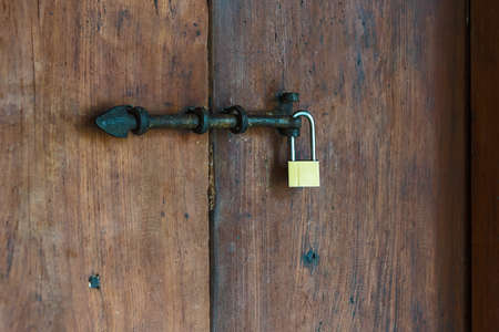 Old wooden door and latch.の写真素材