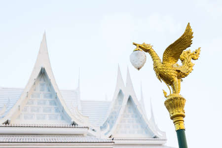The golden swan lamp on electricity in Thailand.の写真素材
