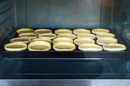Egg tart, are being put to bake.