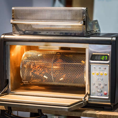 Coffee roasters machine small, like a microwave oven.の写真素材