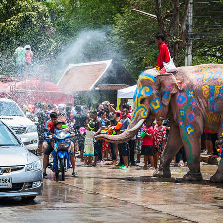 Elephant splashing water during Songkran Festival on Apr 13, 2013 in Ayutthaya, Thailand. Initiated by Tourism Authority of Thailand, elephants take part in the festival to give revelers more fun.のeditorial素材