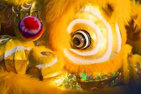 Chinese Lions Head Focus on red eyes.の写真素材