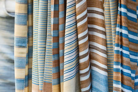 Cotton put on sale has many colors and patterns for people to choose.の写真素材