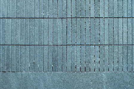 Black slate wall texture and background.