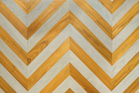 Natural wooden background herringbone, grunge parquet flooring design seamless texture.