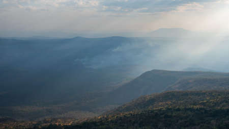 Standing empty on top of a mountain view with clouds before storm at Phu Kradueng National Park,...