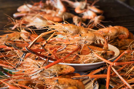 Grilled shrimps on the flaming grill, seafood.の写真素材