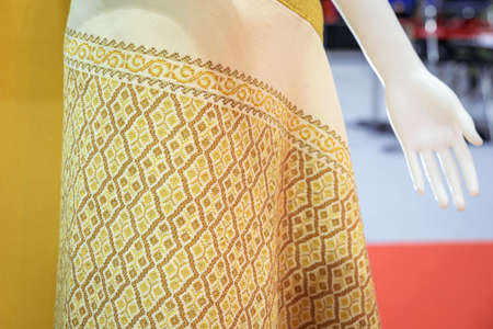 Thai silk fabric pattern on a puppet shirt.の写真素材