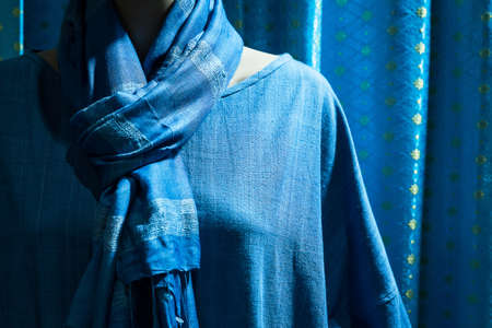 Blue silk scarf on a mannequin.の写真素材