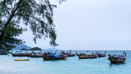 Longtail boat and beautiful ocean of Koh Lipe island, Thailand.の写真素材