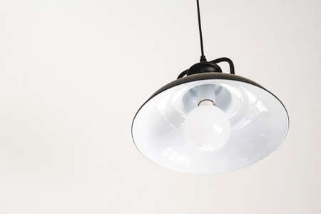The ceiling lamp in the white roomの写真素材