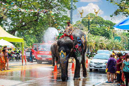 Ayutthaya, Thailand - April 13, 2016: Thailand's Songkran Day is traditionally celebrated on New Year's Day. From April 13 to 15, people and elephants will splash water and have fun.のeditorial素材