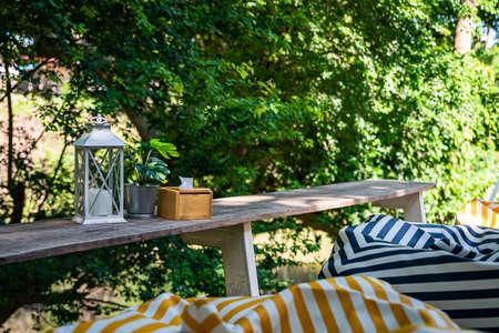 Vintage candle lanterns, tissue boxes and ornamental plants, for decorating your outdoor relaxation area.の写真素材