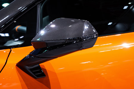 A car side mirror or door mirror is built on the car's exterior to help the driver see areas behind and to the sides of the vehicle.の写真素材