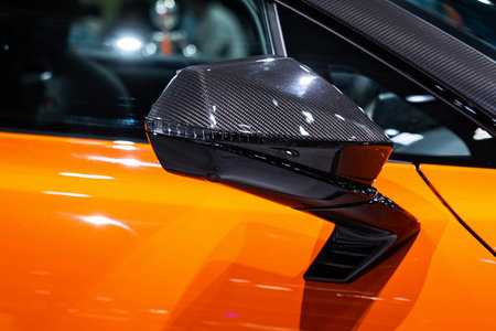 A car side mirror or door mirror is built on the car's exterior to help the driver see areas behind and to the sides of the vehicle.の写真素材