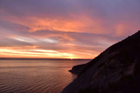 pink sunset in the dark horizonの写真素材