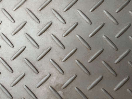 Stainless steel plate with  diamond pattern, silver metal floor texture surface for background or...