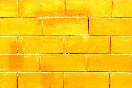Blured background of golden brick wall or textured grungy floor,stock photosの写真素材