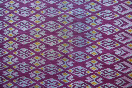 closeup pattern texture of general traditional thai style native handmade  fabric weaveの写真素材