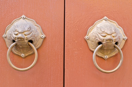 Double doorknob on backgroundの写真素材